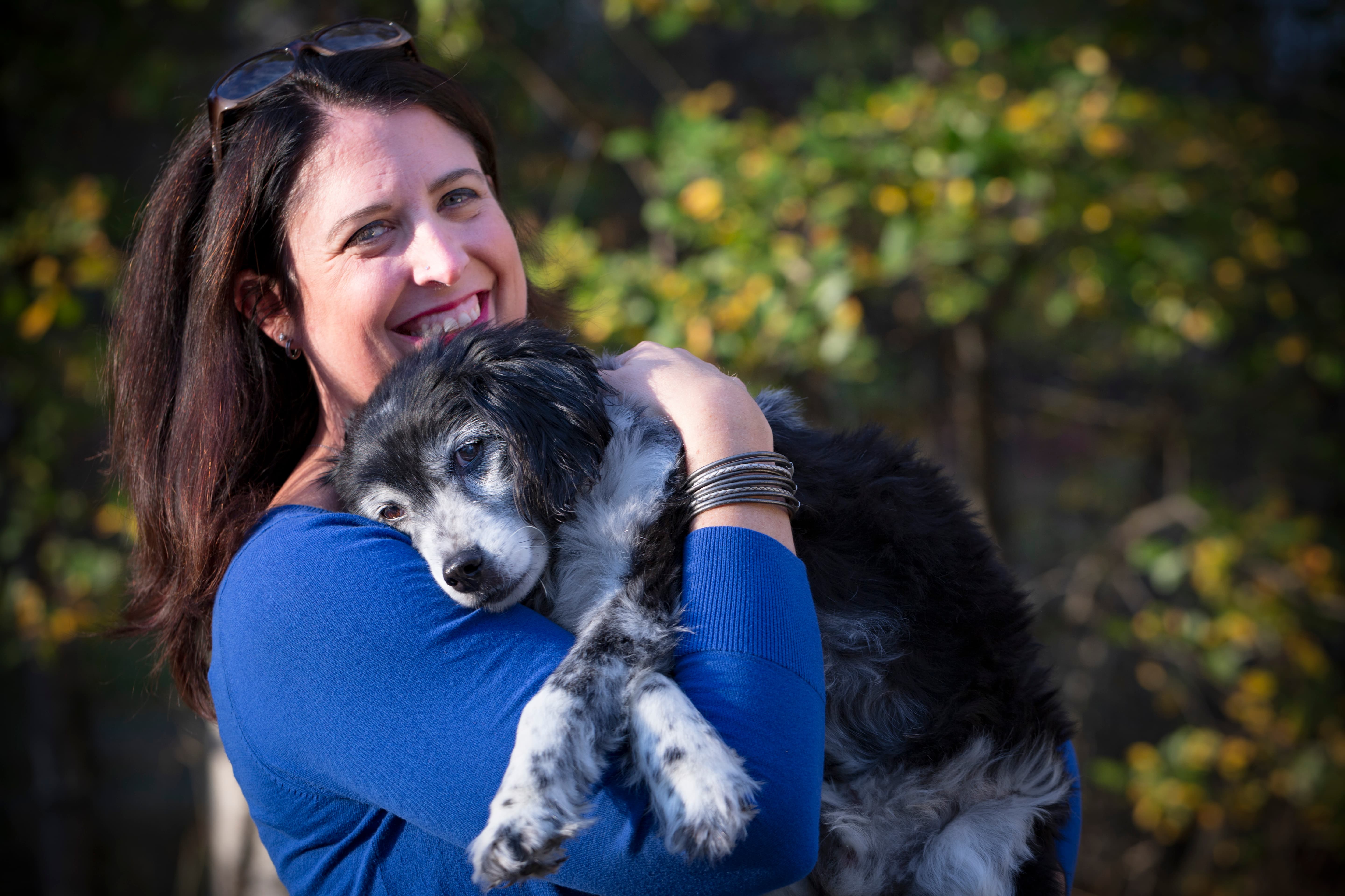 Buddy the dog enjoying the outdoors, playful and full of character