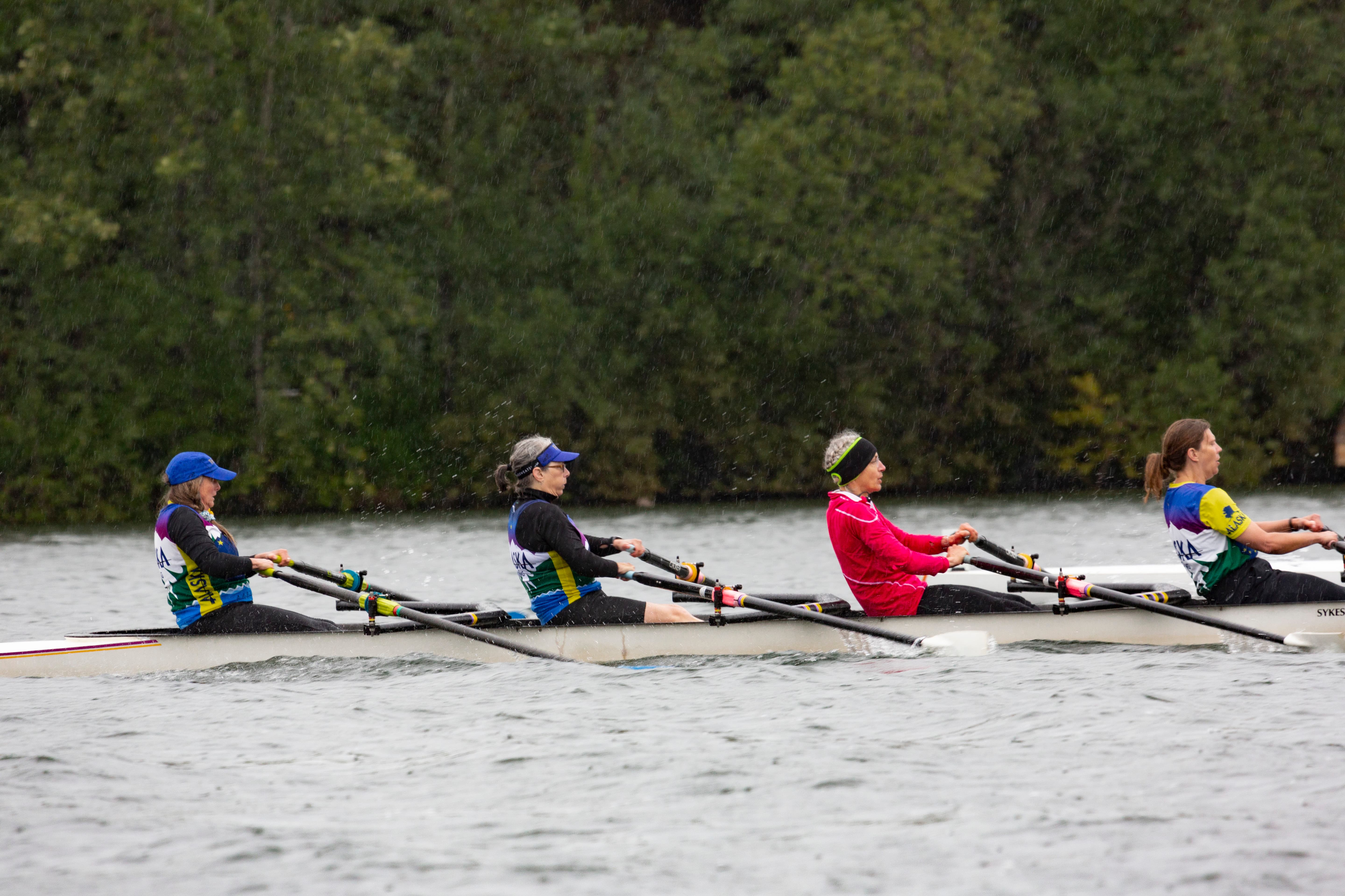 Moose Nugget Regatta — paddlers powering through the water in Anchorage