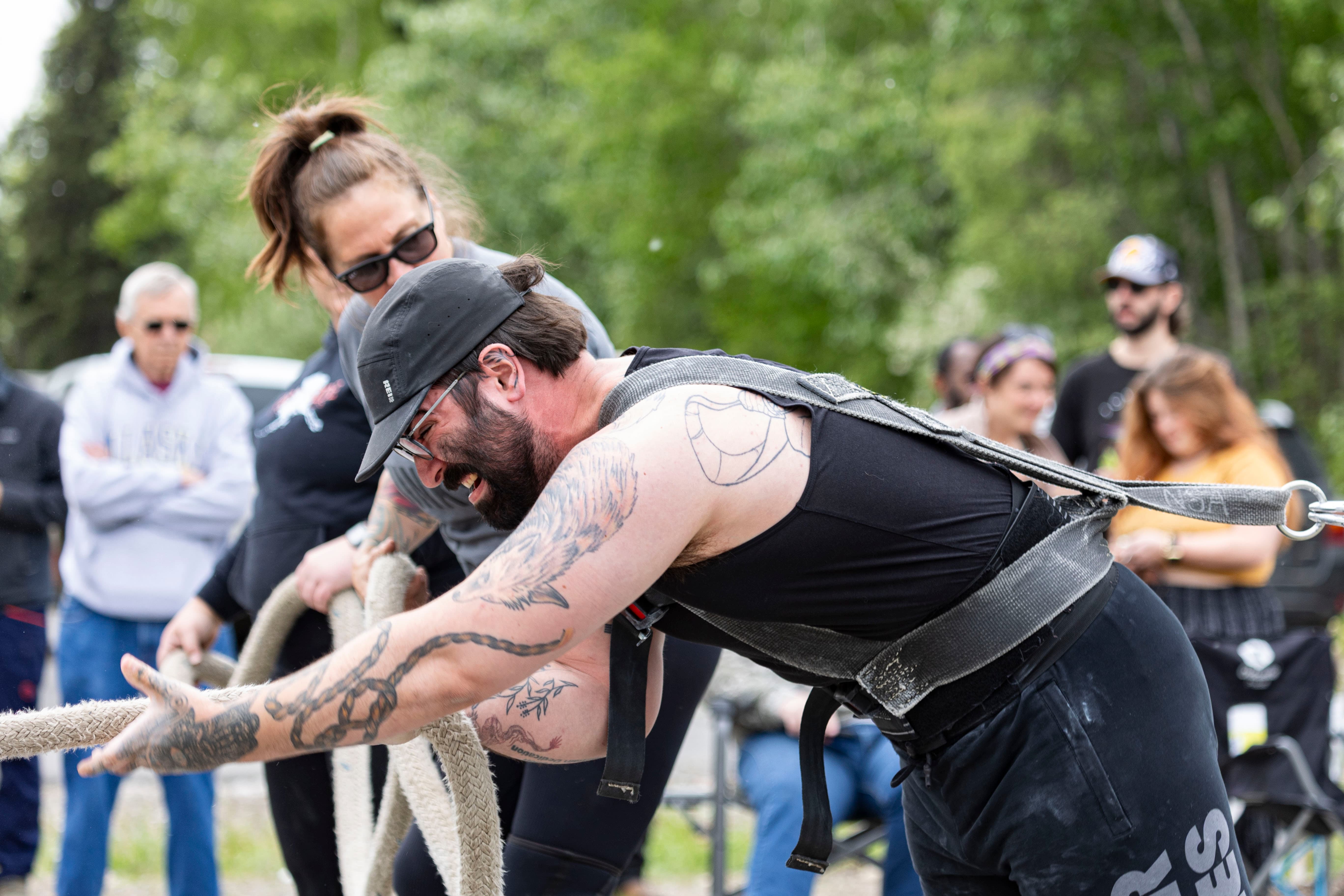 Northside Athletics hurdler with perfect form mid-leap over the barrier