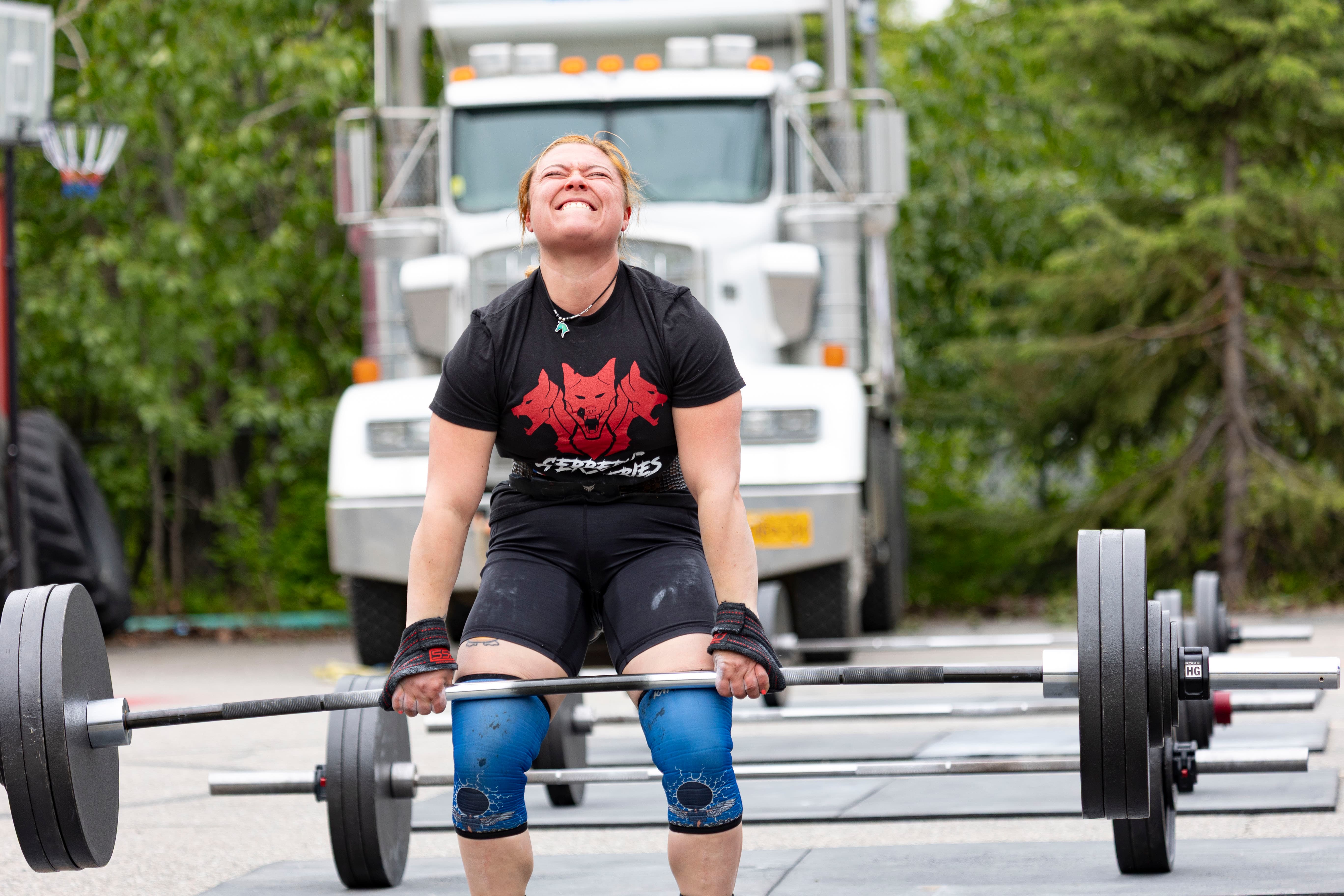 Northside Athletics athlete competing in a field event, focus and determination