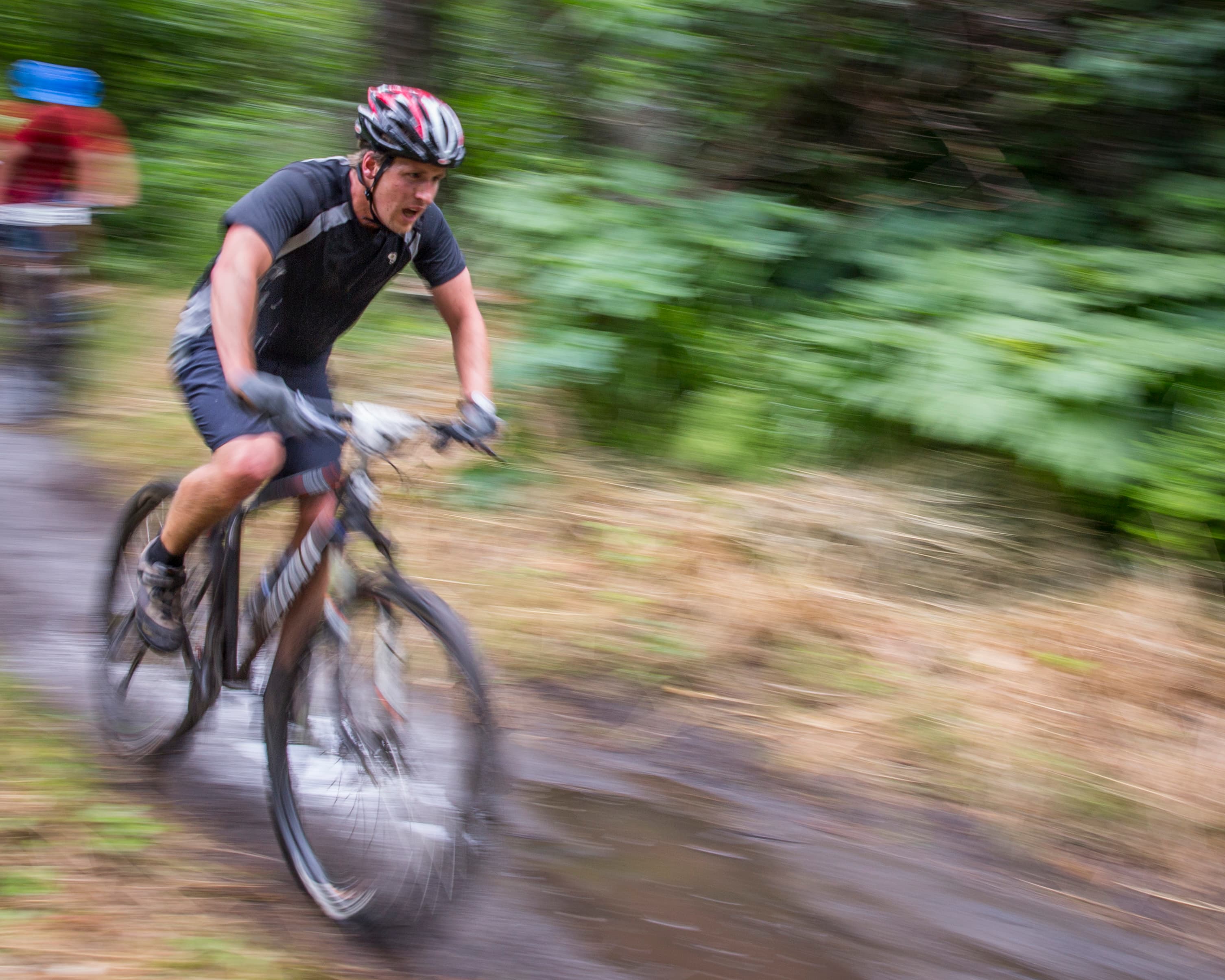 Sports photography — athlete in full competition, captured at peak performance