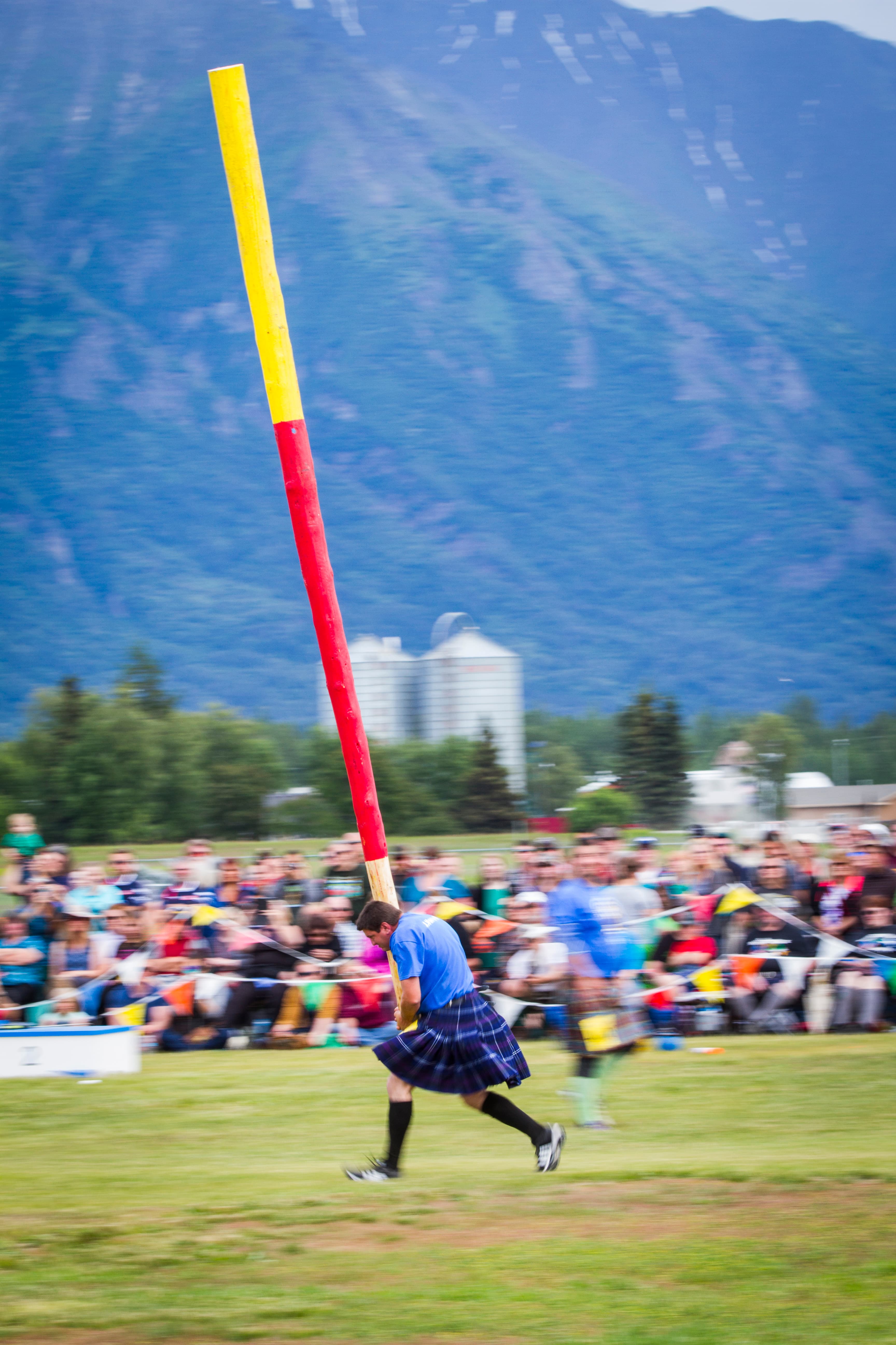Highland Games competitor displaying Scottish athletic tradition and strength