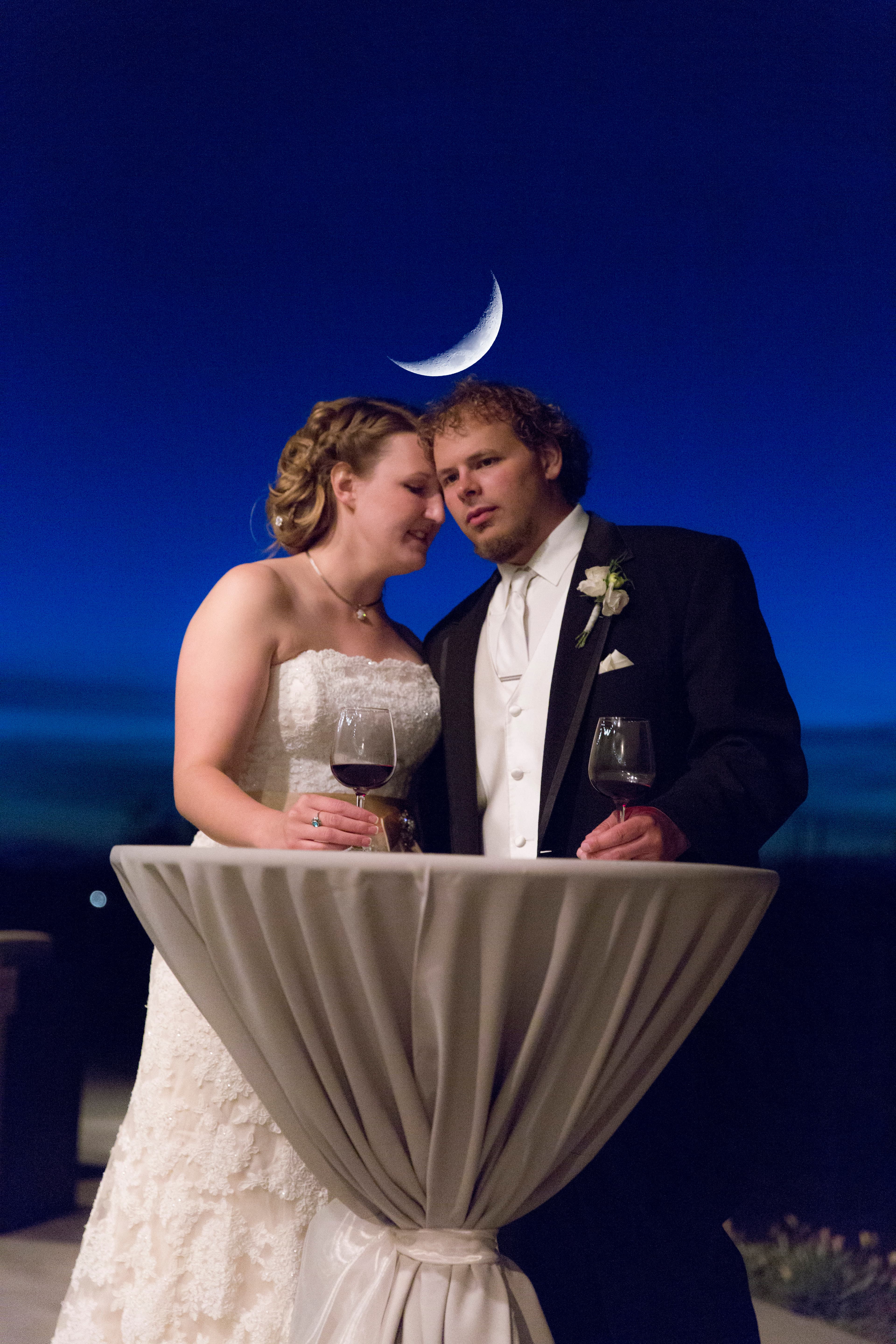 Wedding reception candid — guests celebrating with the newlyweds