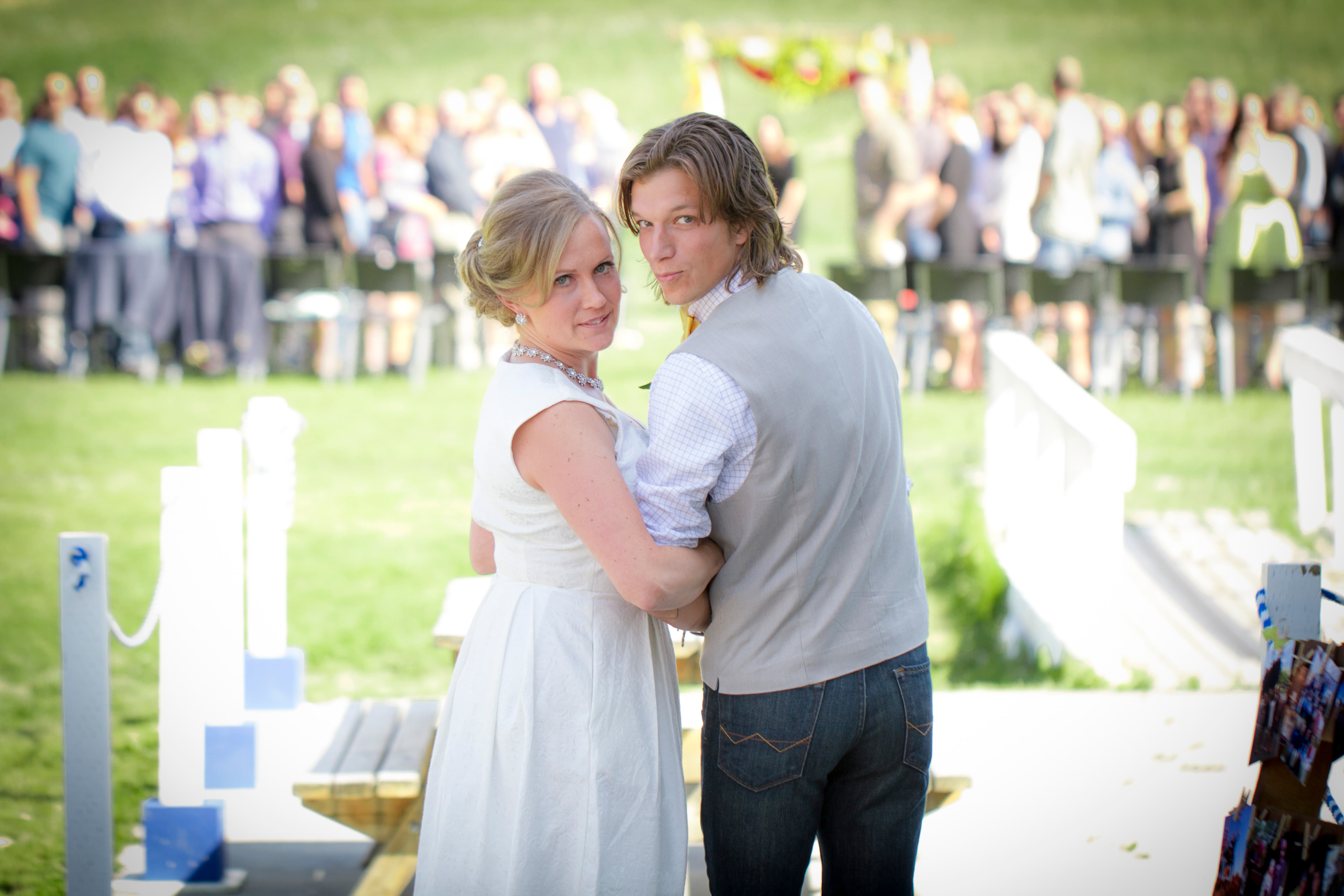 Val and Andy's wedding portrait — formal composition with natural warmth