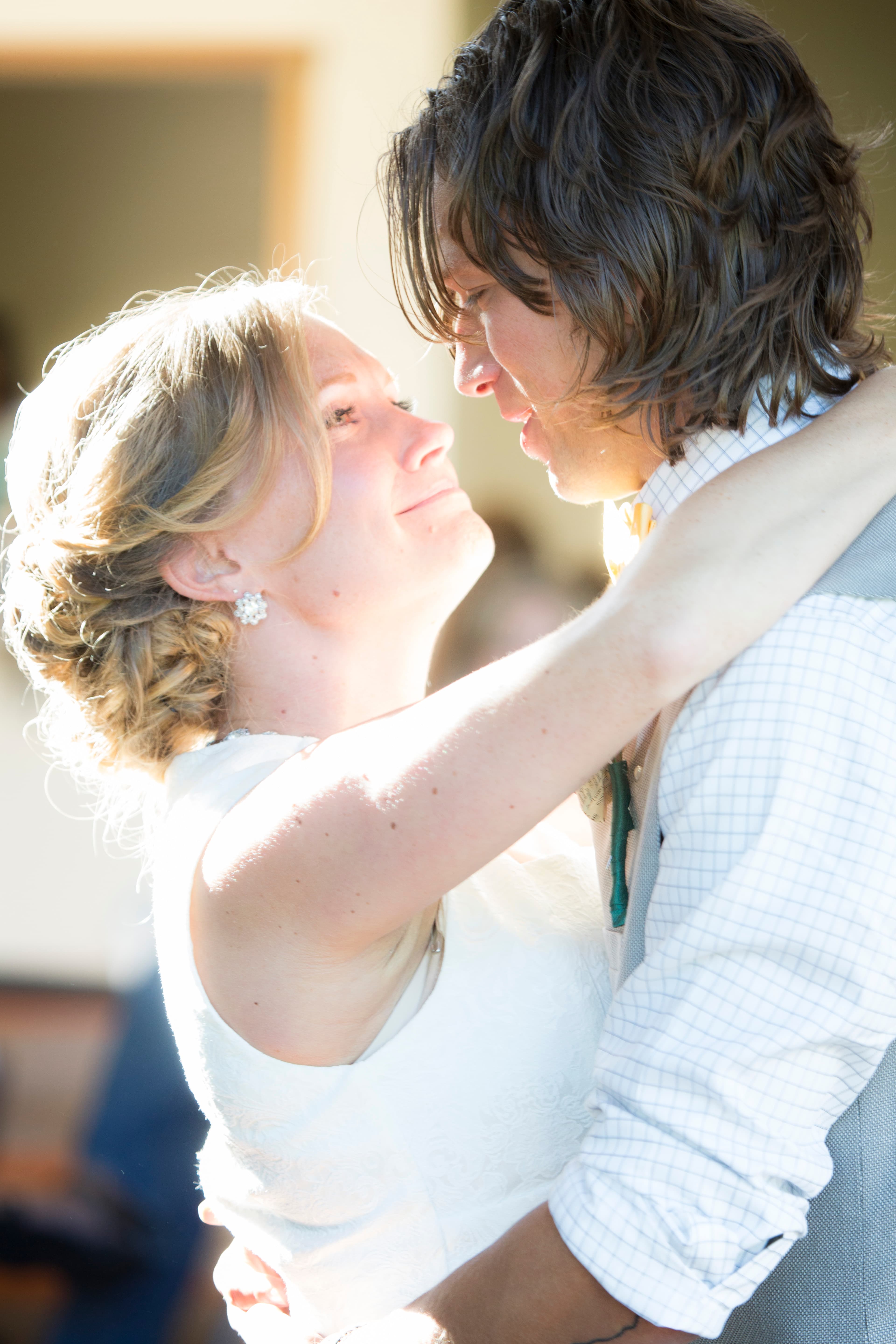 Val and Andy outdoor Alaska wedding — couple walking together in nature