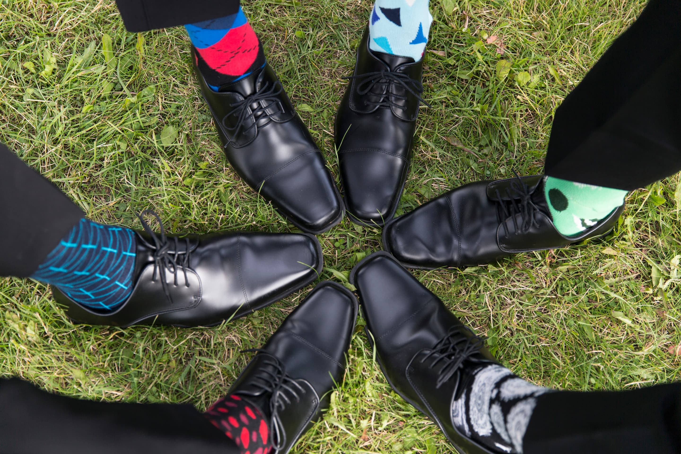 Rob and Becca's outdoor Alaska wedding — ceremony in a lush green setting